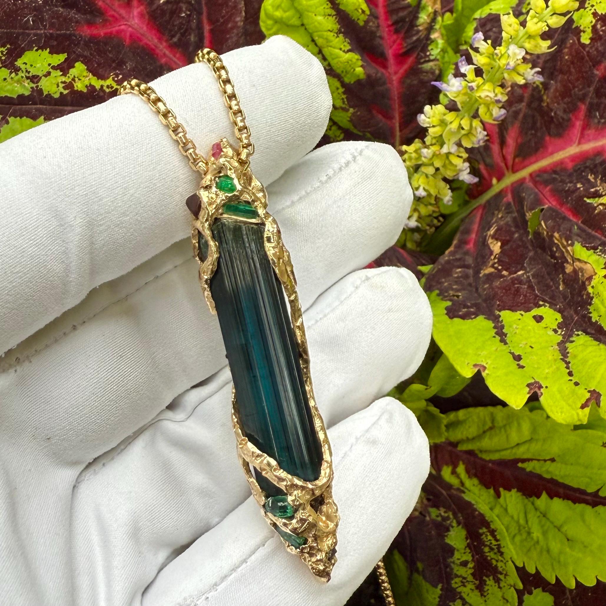 A one-of-a-kind masterpiece crafted from 14k gold, featuring an old stock, Indicolite Pederneira Tourmaline.